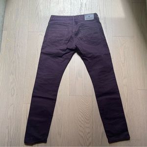 Scotch and Soda men’s maroon jeans.